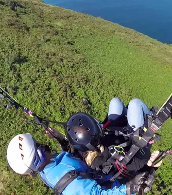 Vuelo premium en parapente en Orio con traslados, pintxo y reportaje incluido