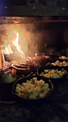Ruta en moto de nieve al atardecer en Formigal con cena en refugio